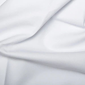Close-up of white fabric with folds