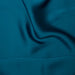 Teal fabric with a smooth texture
