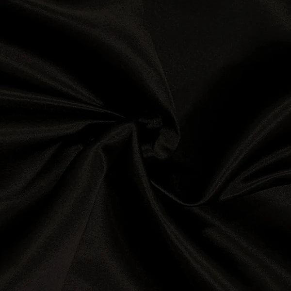 Close-up of black fabric with folds