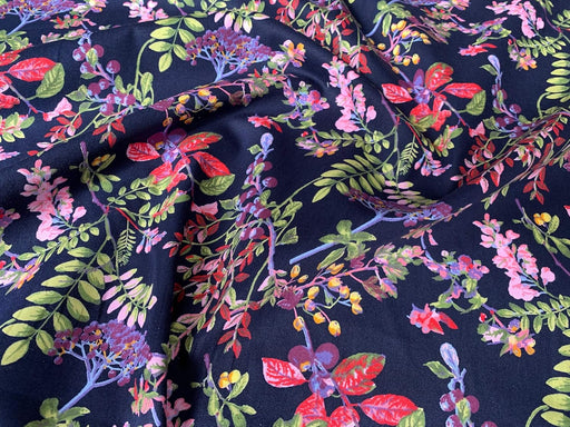 Navy blue fabric with colorful floral pattern
