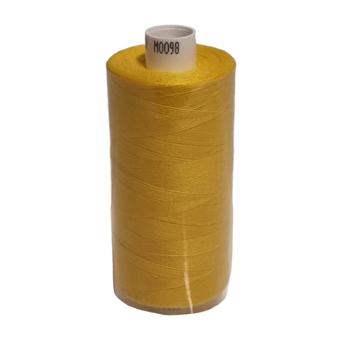 Large spool of yellow thread on a white background