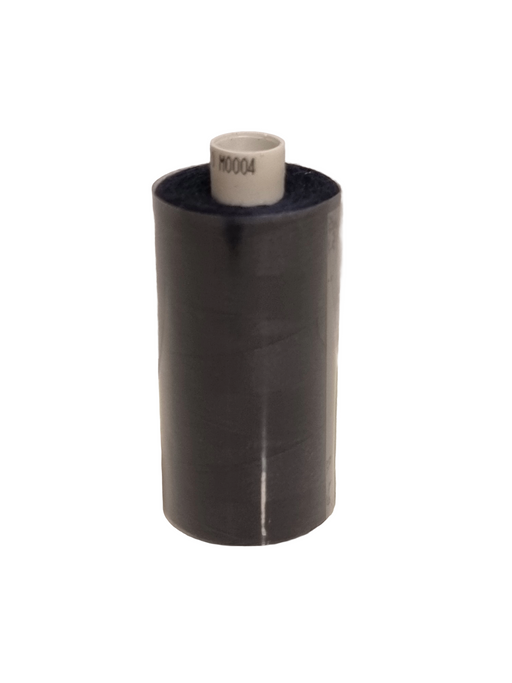 Black cylindrical object with a white label on a white background