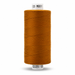 A single spool of sewing thread in a warm mustard yellow color, shown against a plain white background with black printed codes on the top and bottom labels.