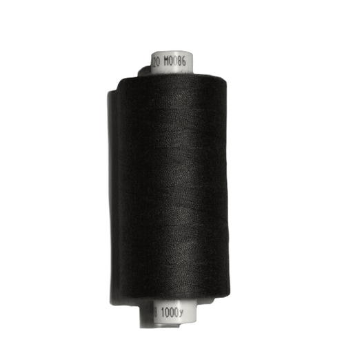 Black thread spool on a white background