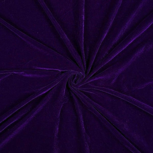 Close-up of purple velvet fabric in a swirl pattern