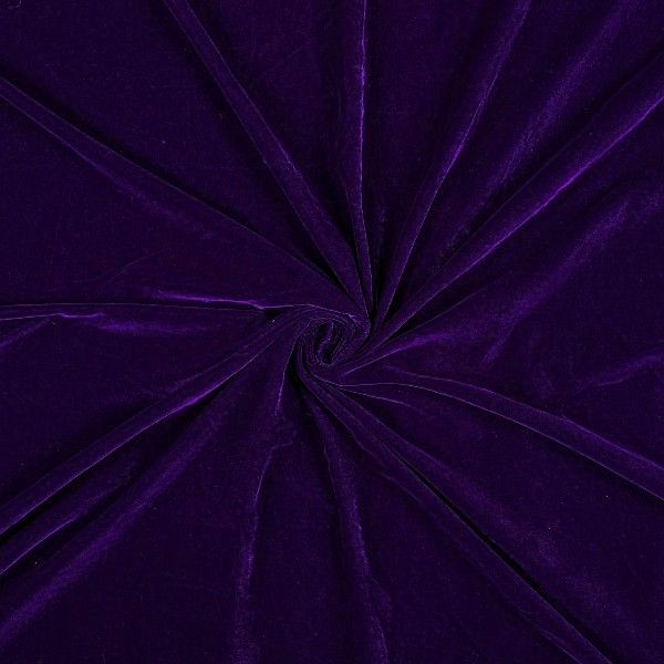 Close-up of purple velvet fabric in a swirl pattern
