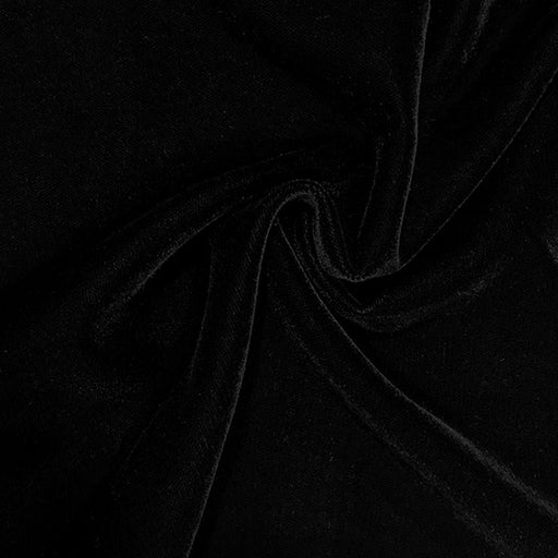 Close-up of black velvet fabric with folds
