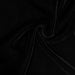 Close-up of black velvet fabric with folds