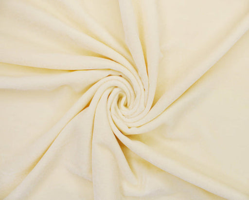 Cream-colored fabric in a swirl pattern