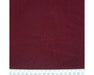 Burgundy fabric swatch with a ruler at the bottom for scale.