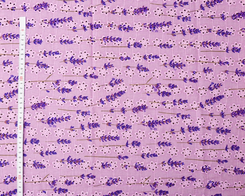 Fabric with lavender pattern on a purple background