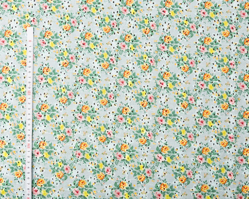 Floral patterned fabric with a ruler on the side