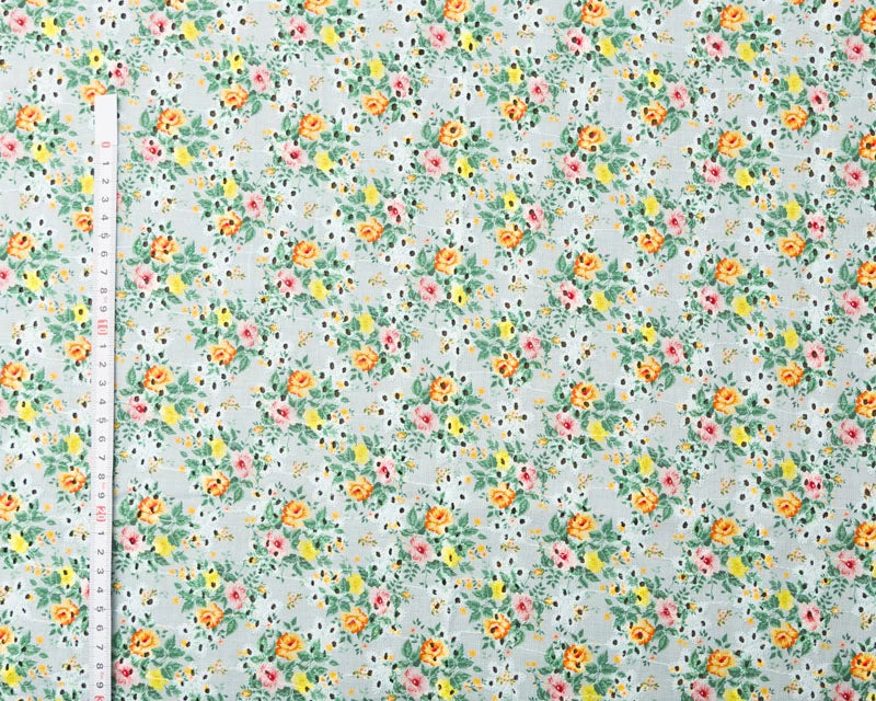Floral patterned fabric with a ruler on the side