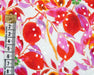 Floral fabric pattern with red and pink flowers on a white background, featuring a ruler for scale.
