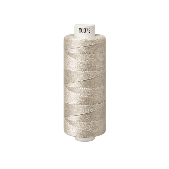 Coats Moon Spun Polyester Thread – Ivory (M0076), 1000 Yard Reel – upright thread reel