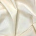 Ivory plain polycotton fabric
